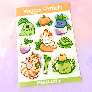 May include: A sheet of stickers featuring cute cartoon characters with vegetable themes. The stickers include a green frog, a white rabbit, a blue and purple creature, a green creature with a yellow top, and a brown and white cat. The stickers are on a white background with green and orange accents. The text "Veggie Patch" is at the top of the sheet.