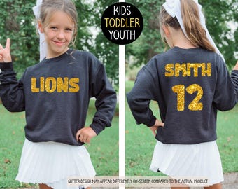 Felpa con nome personalizzato per la squadra dei giovani, maglietta da calcio glitterata per bambini, girocollo con mascotte, regalo per bambini, idea regalo di Natale, spirito scolastico, cheerleader