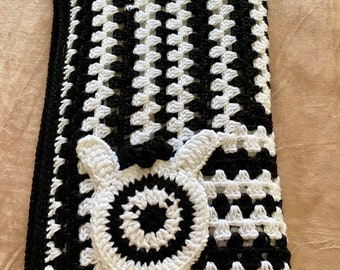 A handmade crochet blanket/zebra motif / black and white sparkling yarn