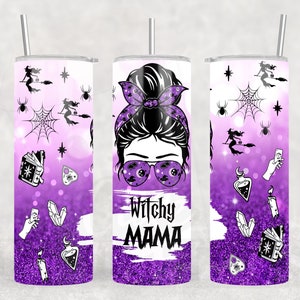 May include: A purple and white tumbler with a glittery background. The tumbler features a cartoon illustration of a woman with a bun in her hair wearing sunglasses and a bandana. The text "Witchy Mama" is written below the illustration.
