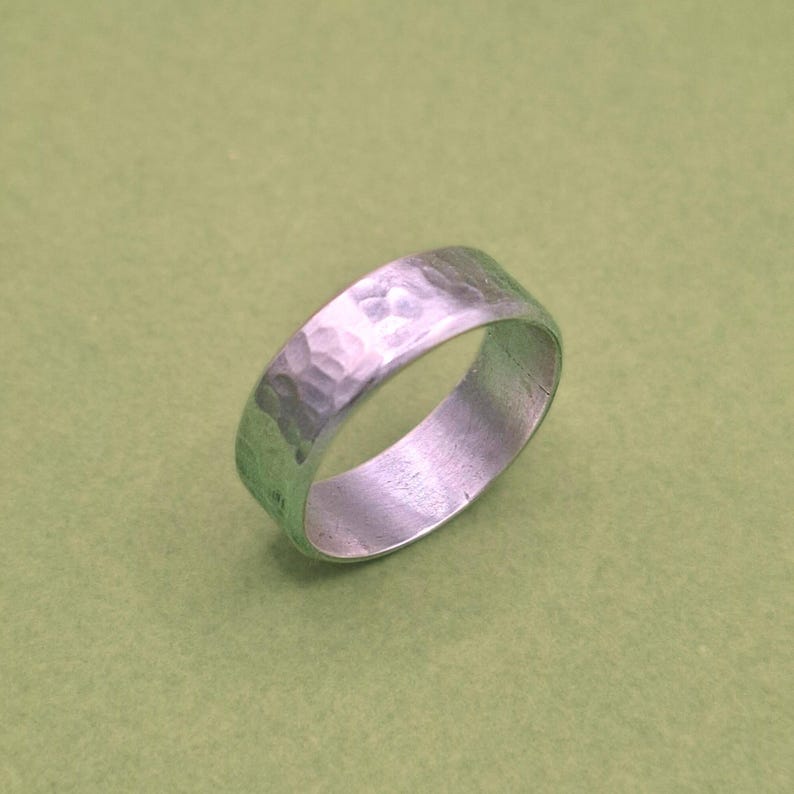 Custom-made solid silver ring Martelé