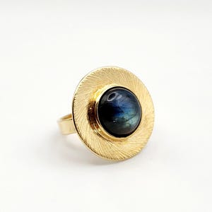 Patricia adjustable ring in gold plating set with a labradorite.