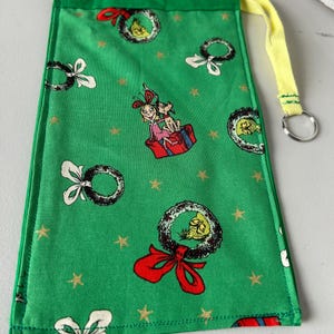 He's A Mean One Phone Pouch, Drawstring Bag with Key Ring, Trinket Bag, Reusable Gift Bag, Double Layer, Hand Crafted, Machine Washable