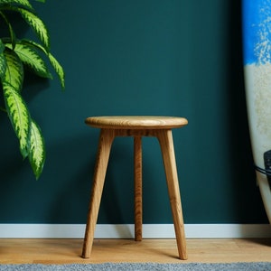 Three-legged stool made of old oak wood, cord tree & blue/black handmade