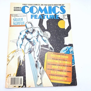 May include: A vintage comic book titled "Comics Feature" with a cover featuring the Silver Surfer. The cover also includes text about Doctor Doom, investing in comics, and Duck Tales. The comic is from June 1987.