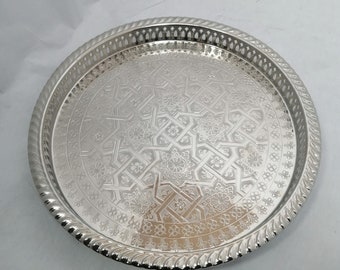 Handmade in nickel plated brass, Round Moroccan serving tray on legs Handcrafted in brass.