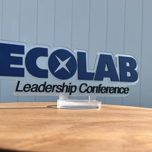 a logo for the "ECOLAB Leadership Conference".