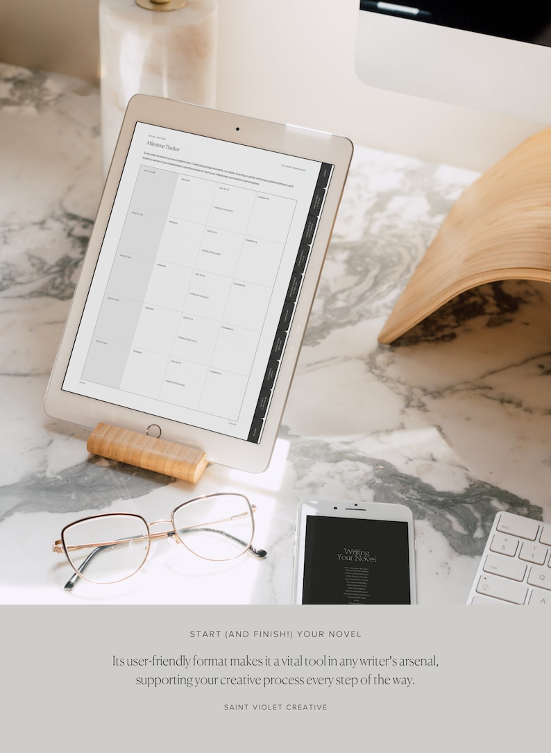 May include: A white tablet computer displaying a printable novel writing planner with the title "Allotment Tracker". The tablet is propped up on a wooden stand. A pair of gold-rimmed glasses and a white smartphone with the text "Writing Your Novel" are also visible on a marble surface.