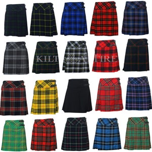 May include: A collection of twenty kilts in various plaid patterns and solid black, each featuring a high waistband with two side buckle straps and pleated fabric. The text KILT ATTIRE is visible across the center of the image grid.
