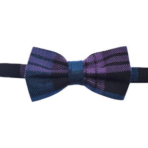 May include: A purple, blue, and black plaid bow tie.