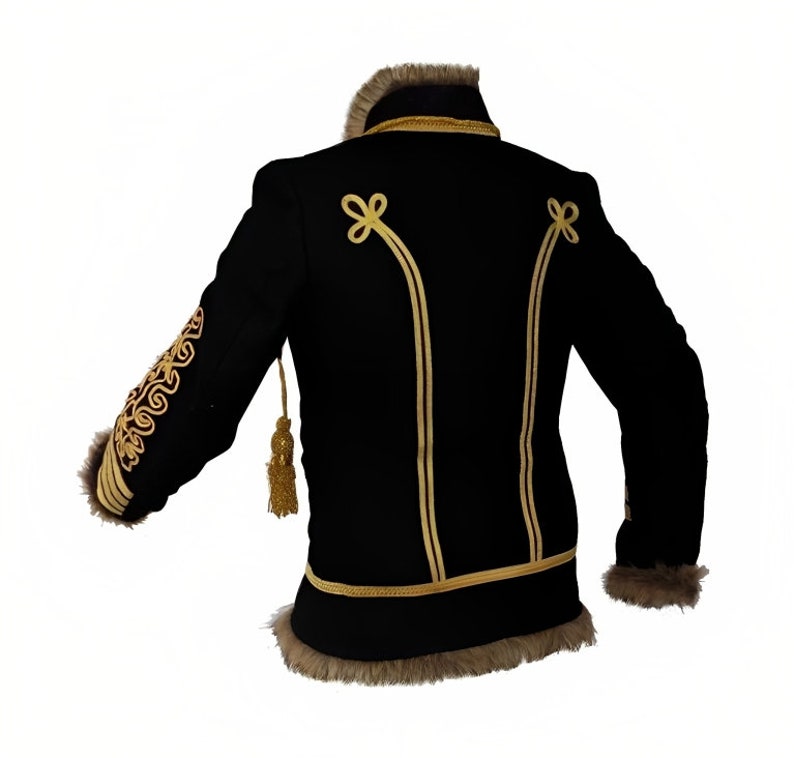 May include: Black jacket with gold trim and a fur collar. The jacket has a decorative design on the sleeves and a gold tassel.