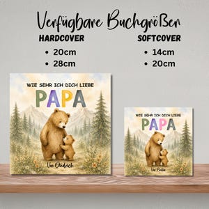 May include: Two square art prints with a watercolor illustration of a bear and cub. The text "WIE SEHR ICH DICH LIEBE PAPA" is above the bear illustration. The hardcover prints are 7.87 and 11.02 inches. The softcover prints are 5.51 and 7.87 inches.