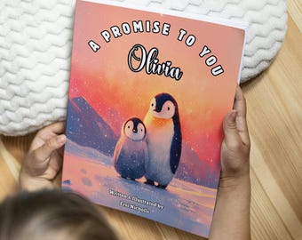 May include: A children's book titled "A Promise to You Olivia" featuring an illustration of two penguins on a snowy landscape. The cover has a warm color palette with text in a playful font. The book is written and illustrated by Ersi Nicholls.