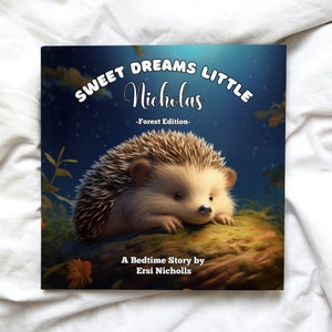 May include: A bedtime story book cover featuring a cute hedgehog with brown and white fur, resting on a mossy rock. The title reads "Sweet Dreams Little Nicholas - Forest Edition -" and the author is listed as "Ersi Nicholls".