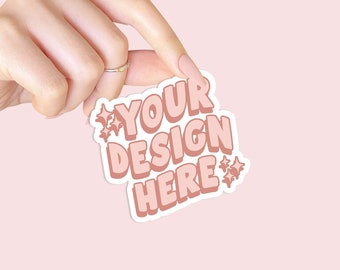 May include: A white sticker with a pink design that says "YOUR DESIGN HERE" with stars around the text.