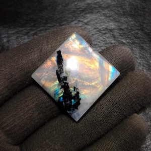 This listing features natural Moonstone cabochons with a beautiful soft glow and subtle flash. Each stone is hand-cut and polished.