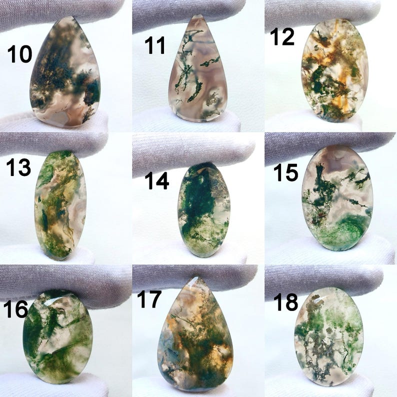 May include: A collection of nine moss agate gemstones, each with unique patterns of green, brown, and white. The stones vary in shape, including oval and teardrop designs. Each stone is numbered from 10 to 18.