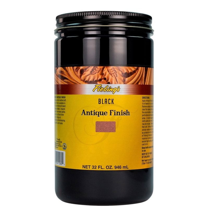 May include: A black jar of Fiebing's Black Antique Finish leather dye. The jar is labeled with the product name and size: NET 32 FL. OZ. 946 ml.