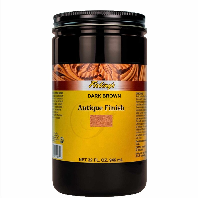 May include: A dark brown bottle of Fiebing's Antique Finish leather dye. The bottle is labeled with the product name, color, and size: 32 fl. oz. (946 ml).