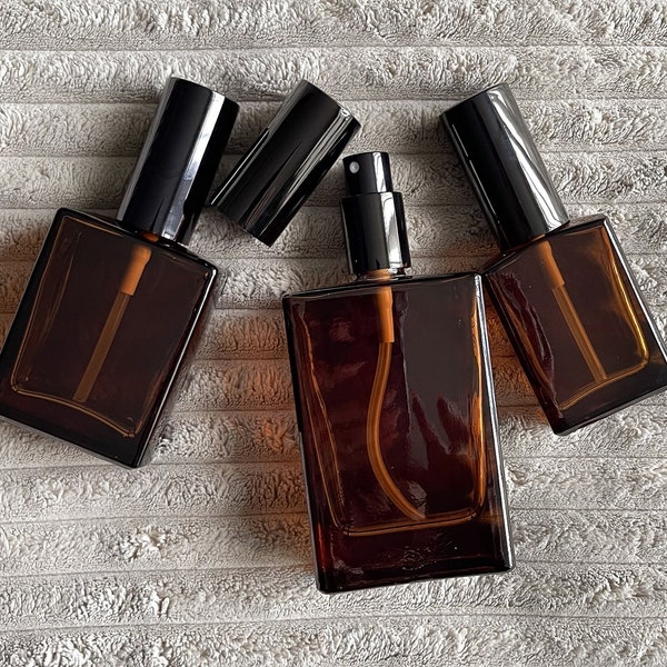 Amber square black spray or pump cap glass spray bottles. Perfume bottle, oil bottle,serum bottle, room spray bottle.Available in wholesale