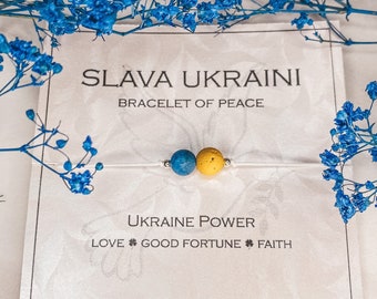 Je soutiens le bracelet bleu et jaune de l’Ukraine, 50% des bénéfices donnés, bijoux en pierres précieuses naturelles en sodalite et en hématite de lave, je suis aux côtés de l’Ukraine