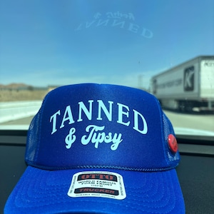 Tanned and tipsy  Trucker Hat