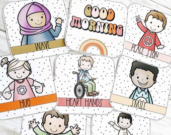 May include: Set of 8 illustrated cards featuring children performing different actions, including waving, hugging, smiling, and dancing. Each card has a white background with black polka dots and a gold border. The text on each card is in black.