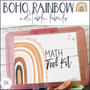 May include: A pink plastic storage bin with a white label that says "MATH Tool Kit". The label has a colorful rainbow design with a white polka dot background.