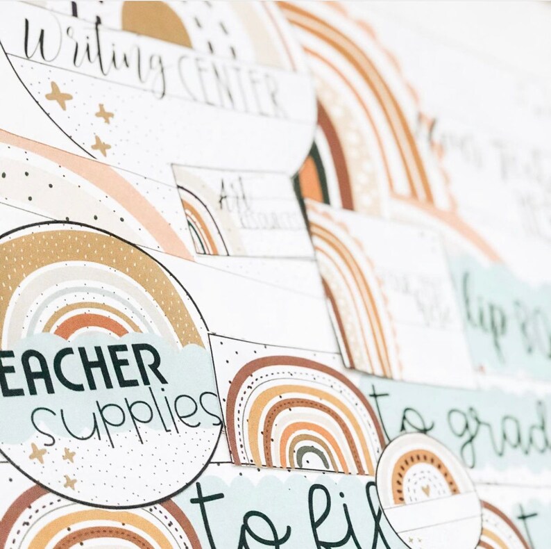 May include: A set of printable classroom labels featuring rainbow designs and the text "Writing Center", "Teacher Supplies", "To Fill", and "To Grade".
