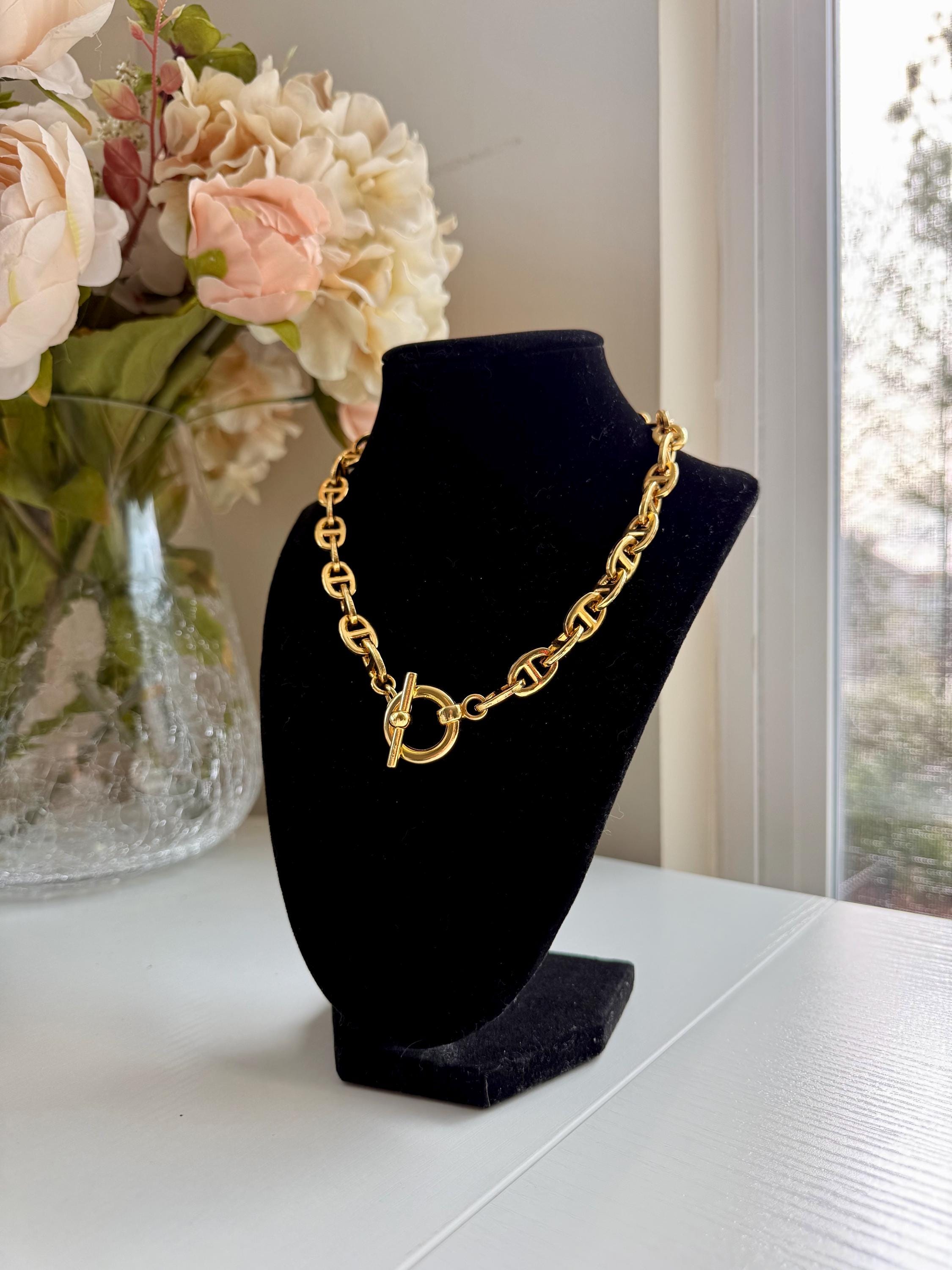 fancy dress gold chain GOLDEN BABY MAXI SATIN DRESS WITH GOLD CHAIN TRIM BLACK – AKIRA main image 0