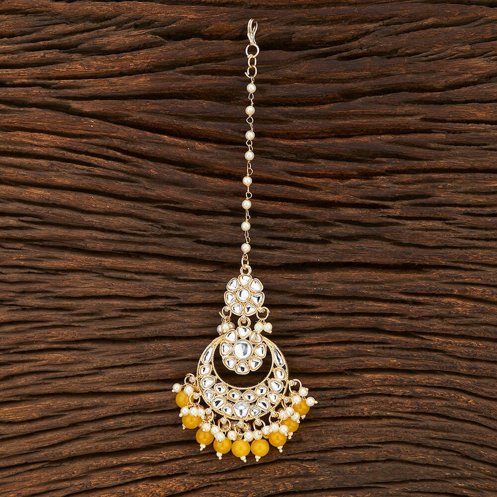 Yellow maang tikka deals