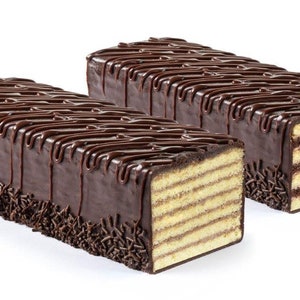 May include: Two chocolate cakes with layers of cake and chocolate frosting. The cakes are decorated with chocolate sprinkles.
