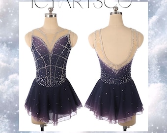 May include: A dark purple figure skating dress with a sheer bodice and a layered skirt. The dress is decorated with rhinestones and has a V-neckline.