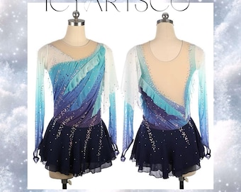 May include: A figure skating dress with a blue and purple ombre design. The dress has long sleeves and a ruffled neckline. The skirt is a dark blue color and has a layered design.
