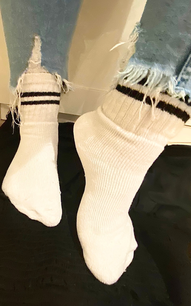 Worn sports socks, worn socks, white sports socks worn, worn whi Worn sports socks, worn socks, white sports socks worn, worn whi