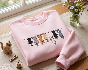 Embroidered Cute Cats Hanging On Clothesline Sweatshirt, Funny Multi Cartoon Kitten Sweater, Pastel Cat Mom Crewneck, Pet Owner Shirt