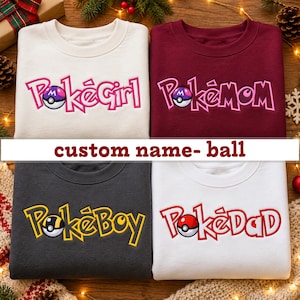 May include: Four crewneck sweatshirts featuring embroidered text and ball graphics. The cream sweatshirt says PokeGirl, the maroon says PokeMom, the dark gray says PokeBoy, and the white says PokeDad. Each design includes a stylized ball icon.