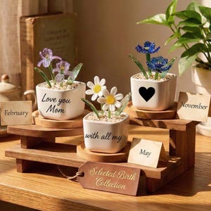 May include: A rustic wooden sign with the text "Welcome to our home" in white lettering. The sign features a distressed finish and a simple, inviting design, perfect for entryway decor.