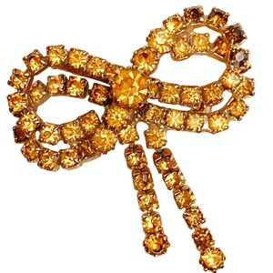 Vintage Mid Century Gold Tone Bow Brooch With Yellow Prong Set Rhinestones 1950s