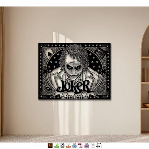 May include: A rectangular black and white wall art print featuring a detailed illustration of the Joker character. The design includes the word JOKER in bold lettering, surrounded by a circular frame, playing card motifs, and suit symbols.
