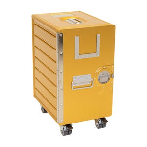 May include: A gold-colored metal rolling case with a handle on top and a silver latch on the side. The case has several horizontal grooves and is on four wheels.