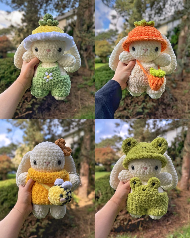 May include: Four crocheted bunny plushies with different outfits. The first bunny is wearing a green and white outfit with a yellow flower hat. The second bunny is wearing an orange hat and a brown bag. The third bunny is wearing a yellow sweater and holding a bee. The fourth bunny is wearing a green frog hat and a green frog outfit.