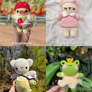 May include: Four crocheted plushies: a strawberry-themed duck, a pink bear wearing a dress, a yellow bear with a bee bag, and a green frog wearing a yellow dress with a crown.