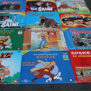 12 DVD set TV en Striphelden | The Saint | On the Buses | Asterix | Kuifje | Swiebertje | Beugelbekkie | Thunderbirds | Suske en Wiske