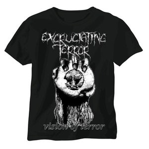 May include: Black t-shirt with a white graphic of a hand holding a skull with the text "Excruciating Terror" and "Vision of Terror" printed on the front.
