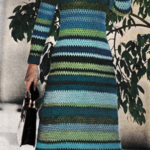 May include: A long-sleeved crochet dress with a striped pattern in shades of blue, green, and white.
