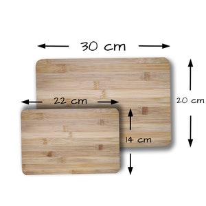 May include: Two wooden cutting boards, one is 22 inches by 30 inches and the other is 14 inches by 22 inches.
