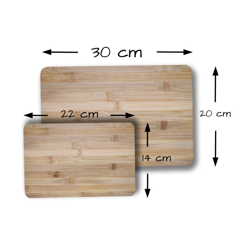 May include: Two wooden cutting boards, one is 22 inches by 30 inches and the other is 14 inches by 22 inches.