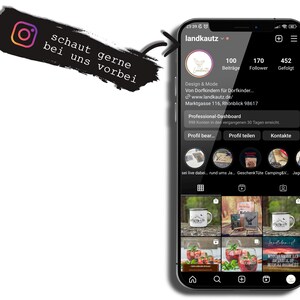 May include: A screenshot of a mobile phone displaying an Instagram profile for a business called "landkautz". The profile has 100 posts, 170 followers, and 452 people following the account. The profile description reads "Design & Mode Von Dorfkindern f&uuml;r Dorfkinder... www.landkautz.de/ Marktgasse 116, Rh&ouml;nblick 98617". The profile also includes a "Professional-Dashboard" section and buttons for "Profil bear...", "Profil teilen", and "Kontakte".