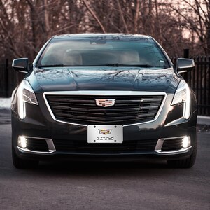 thumbnail image 2 of Eurosport Daytona Cadillac 3D Crest Mirrored Chrome Stainless Steel License Plate 2 of 5